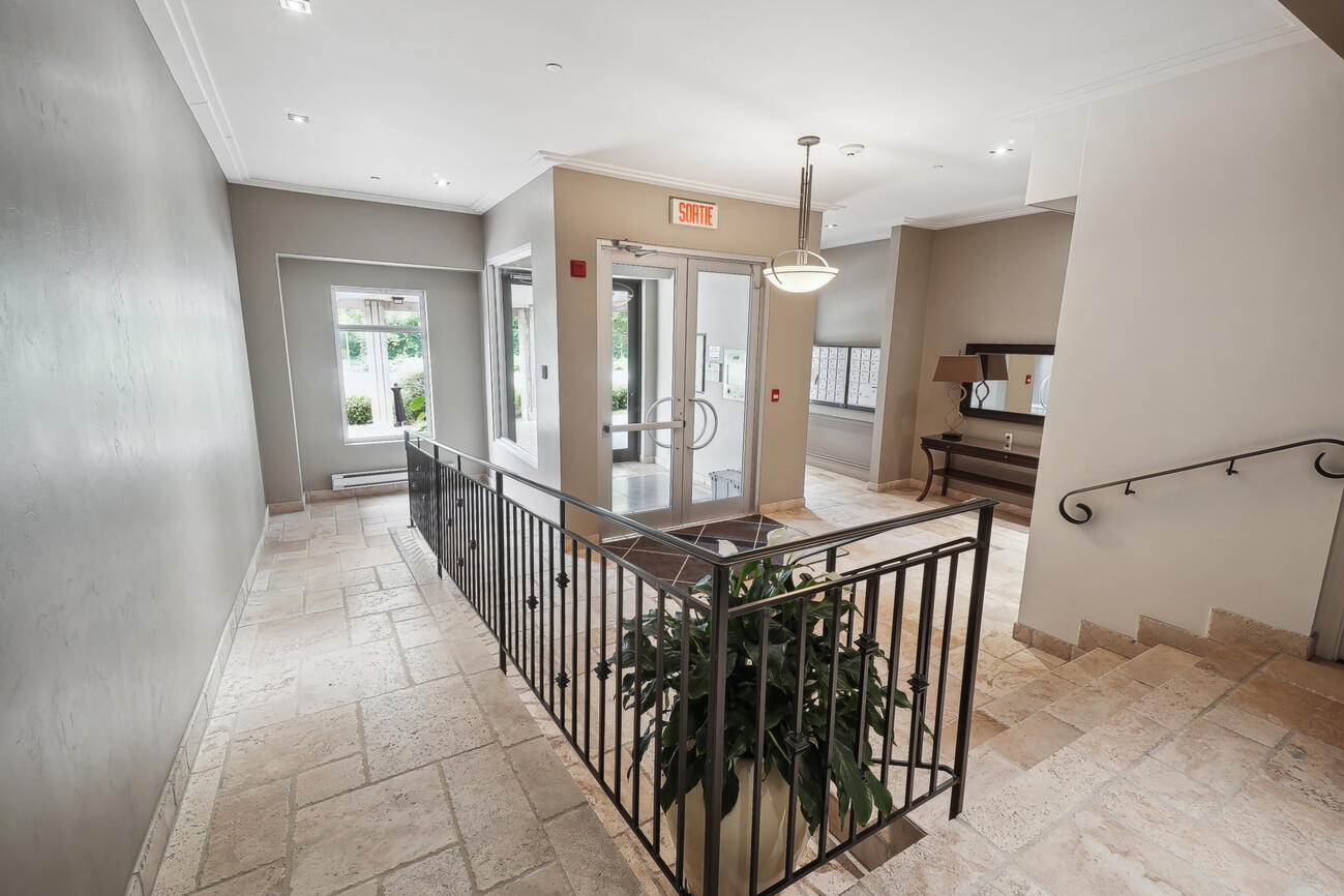 Bright entrance lobby with mailboxes
