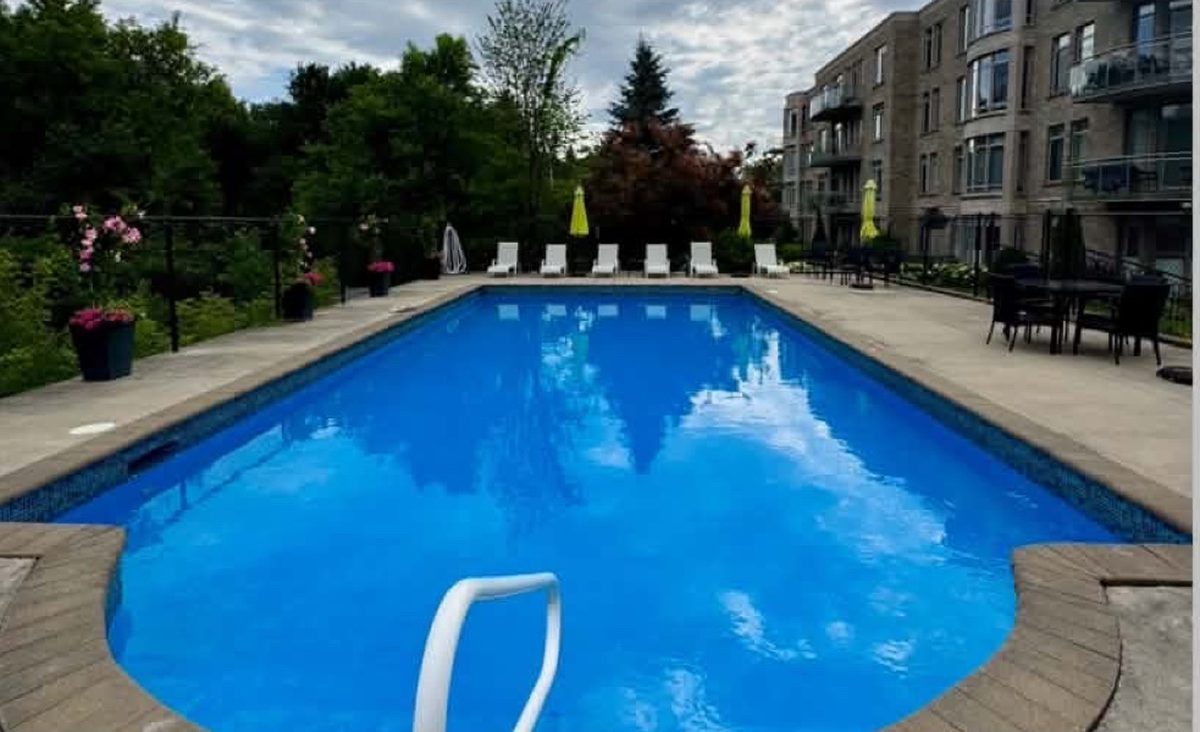 The saltwater pool and terrace at Le Cartier du Village